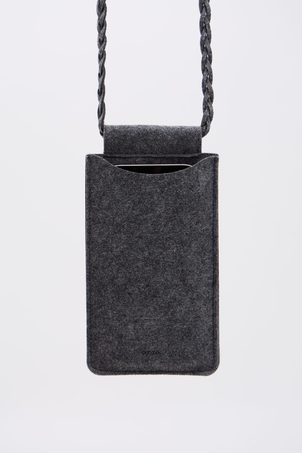 Gray felt bag for phone with a rope handle on a white background