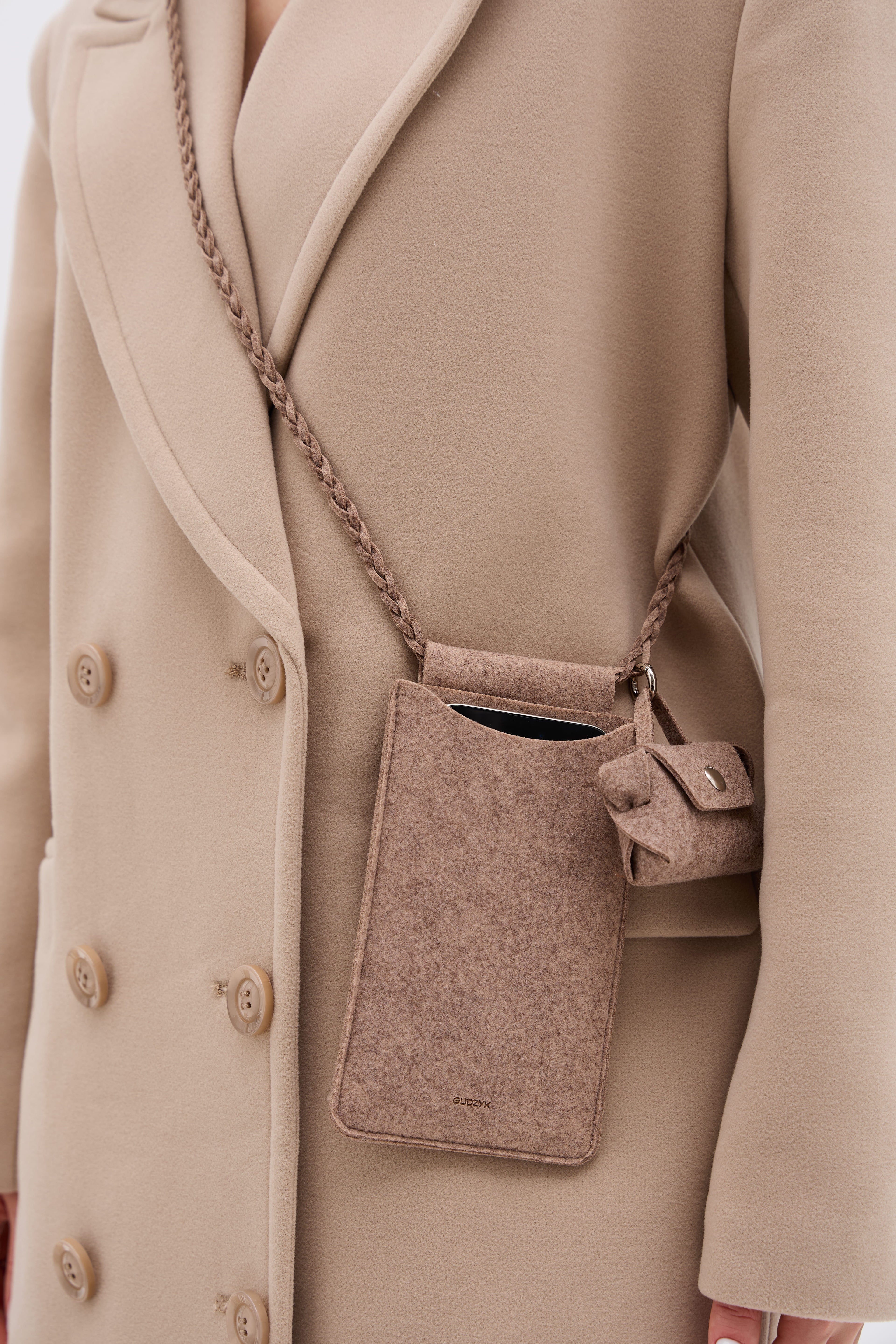 Beige coat with a matching crossbody bag